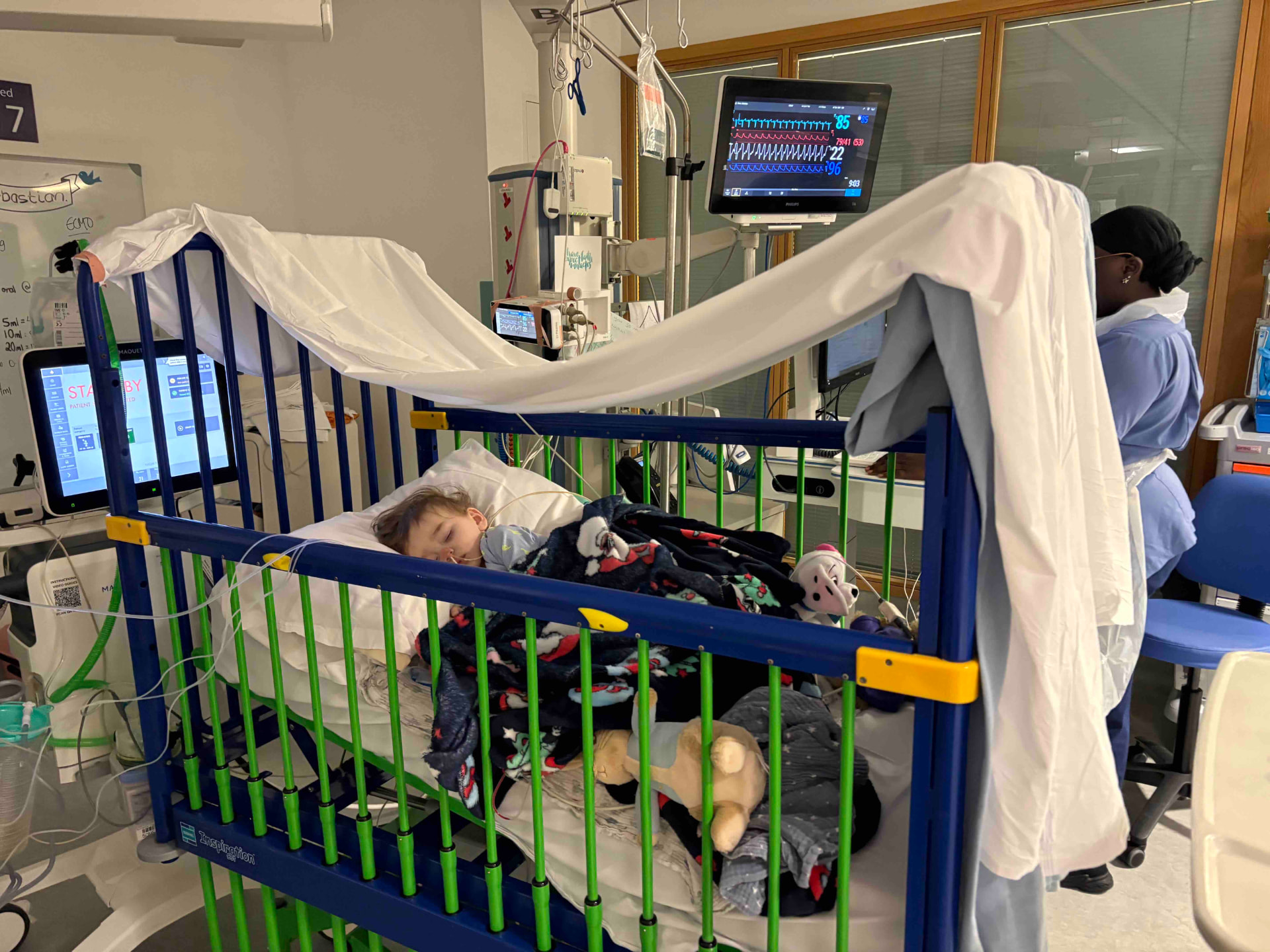 Sebastian resting in a pediatric intensive care unit